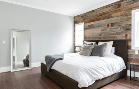 Custom designed bedroom with barn boarded walls