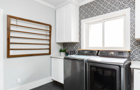Muskoka Built Customized laundry room with washer and dryer