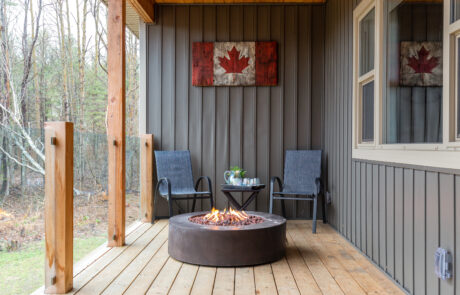 Back Porch with Firetable and enclosed Roof Muskoka Lakes